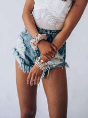 Pantalones de cintura alta con borlas rotas