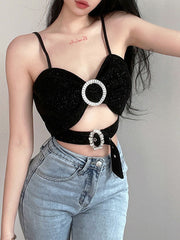 Chaleco camisola calado con hebilla de metal