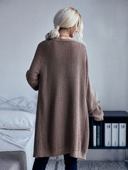 Einfarbige lange Strickjacke