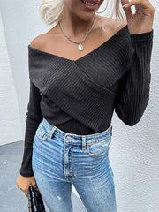 Top de punto con cuello en V de color liso