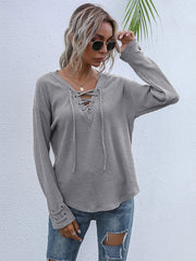 Camiseta de color liso con cuello en V