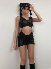 Conjunto de dos piezas de top y pantalón de piel sintética negra