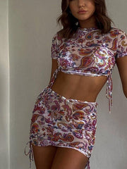 Three-piece set of printed mesh see-through round neck short skirt