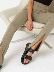 Pantalones ajustados con aberturas de cremallera