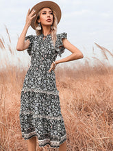 Vestido largo floral con escote en V ajustado