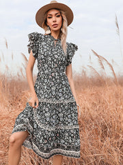 Vestido largo floral con escote en V ajustado