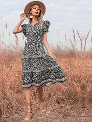 Vestido largo floral con escote en V ajustado