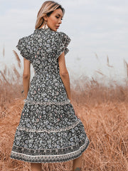 Vestido largo floral con escote en V ajustado