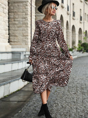 Kleider mit Rüschen und langen Ärmeln und Leopardenmuster