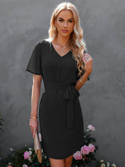 Vestido holgado con volantes y cuello alto