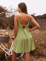 Rückenfreies, lockeres grünes Kleid mit hoher Taille