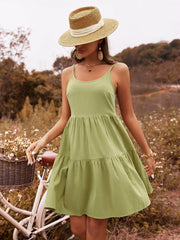 Rückenfreies, lockeres grünes Kleid mit hoher Taille