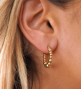 Aros de bola de oro graduados