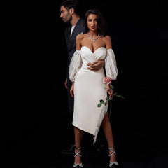 Vestido midi ajustado con borlas, manga larga y hombros descubiertos