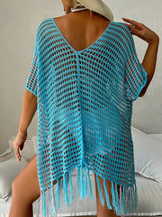 Kleid mit ausgehöhlten Quasten