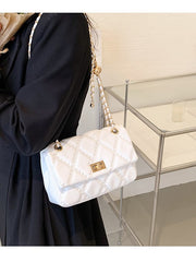 Bolso cuadrado con cadena de rombos