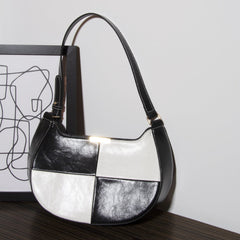 Black and white checkerboard single-shoulder handbags