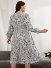 Vestido con escote en V, manga larga y cintura elástica