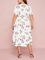 Vestido estampado con escote en V y falda de gasa holgada de longitud media