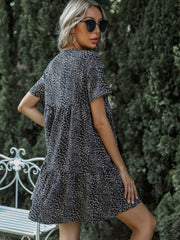 Vestido corto estampado con vuelo