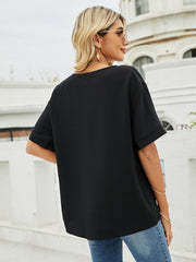 Camisa informal holgada de manga corta con cuello en V y color liso