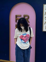 Camiseta holgada de cuello redondo y manga corta con estampado de letras