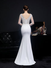 Vestido de noche de encaje de manga larga