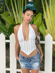 Chaleco de color liso con cuello halter y espalda descubierta con gancho