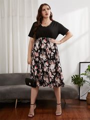 Vestido holgado de cintura alta con cuello en V y manga corta