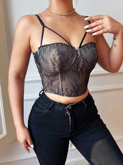 Chaleco pequeño con parte superior de encaje con tirantes cruzados en el pecho y espalda abierta