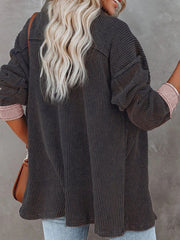 Abrigo de manga larga de una sola fila con solapa