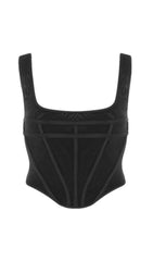 Top corto con tirantes y costuras