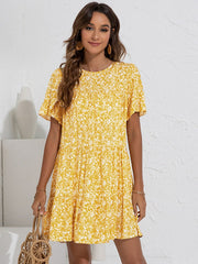 Vestido holgado con cuello redondo, mangas con volantes y estampado floral