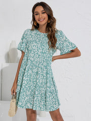 Vestido holgado con cuello redondo, mangas con volantes y estampado floral