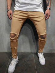 Pantalones casuales lavados con rotos y personalidad de moda