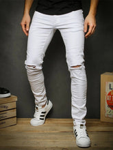 Pantalones casuales con cremallera y deshilachados