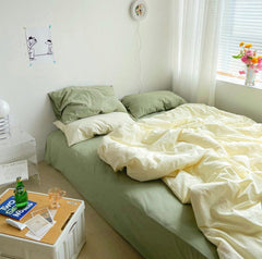 Juego de cama de colores mixtos: verde y amarillo