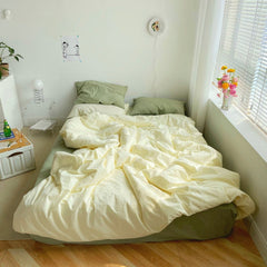 Juego de cama de colores mixtos: verde y amarillo