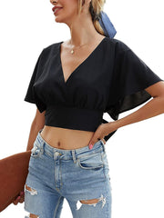 Top corto con cuello en V, mangas de muñeca y lazo en la espalda