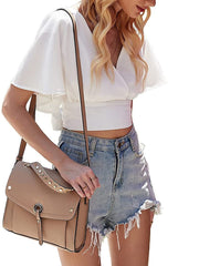 Top corto con cuello en V, mangas de muñeca y lazo en la espalda