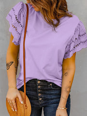 Top casual con cuello redondo y color liso