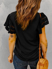 Top casual con cuello redondo y color liso