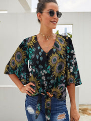 Lockeres Oberteil mit V-Ausschnitt, langen Ärmeln und Knopfleiste