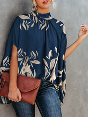 Camisa de cuello redondo con mangas holgadas de muñeca