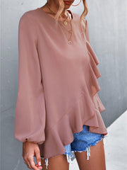 Top irregular con mangas farol y volantes de color liso