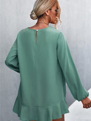 Top irregular con mangas farol y volantes de color liso