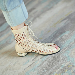 Botines con punta abierta y aberturas Ria