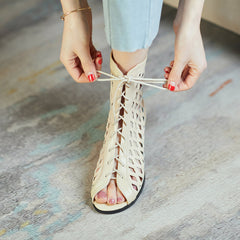 Botines con punta abierta y aberturas Ria