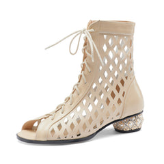 Botines con punta abierta y aberturas Ria