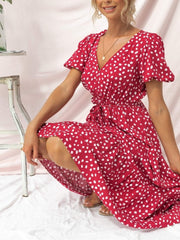 Vestido con estampado de lunares y cuello en V